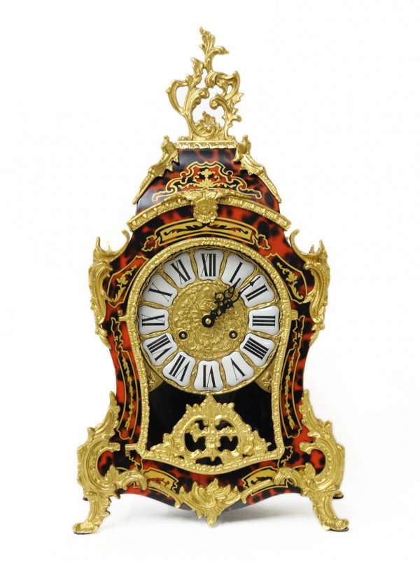 A ROCCOCO STYLE MODERN MANTLE CLOCK Italy: A ROCCOCO STYLE MODERN MANTLE CLOCK Italy, Twentieth Century with Franz Hermle clock works, bronze ormolu, tortoise shell painted background under gilt painted overlay, enameled roman numeral dial 22 
