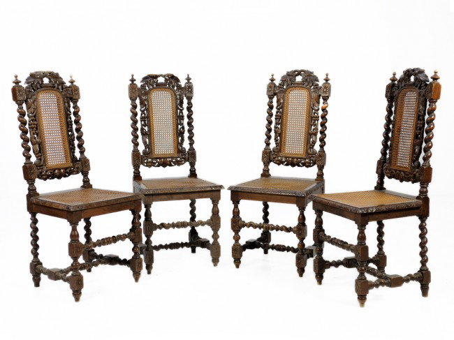 A SET OF FOUR BLACK FOREST OAK CHAIRS: A SET OF FOUR BLACK FOREST OAK CHAIRS cane seats 48 x 18 x 16 1/2 inches