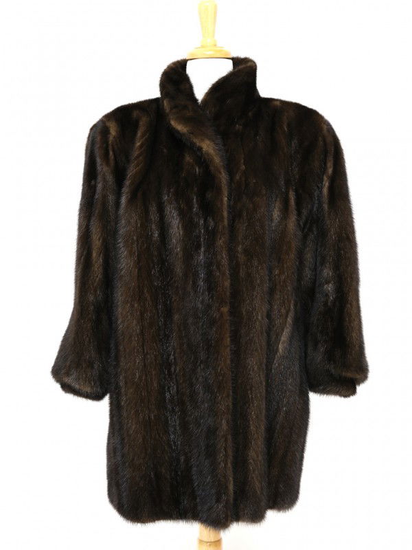 A JOHN TAUBEN RICH DARK BROWN MINK COAT: A JOHN TAUBEN RICH DARK BROWN MINK COAT with gathered belled 3/4 sleeves, two side pockets approximately size 8 - 10