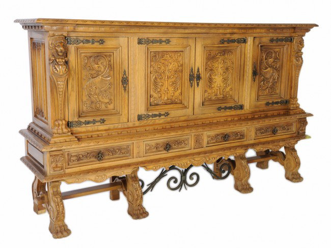 A RENAISSANCE STYLE OAK SIDEBOARD: A RENAISSANCE STYLE OAK SIDEBOARD iron stretcher 57 x 98 x 23 inches
