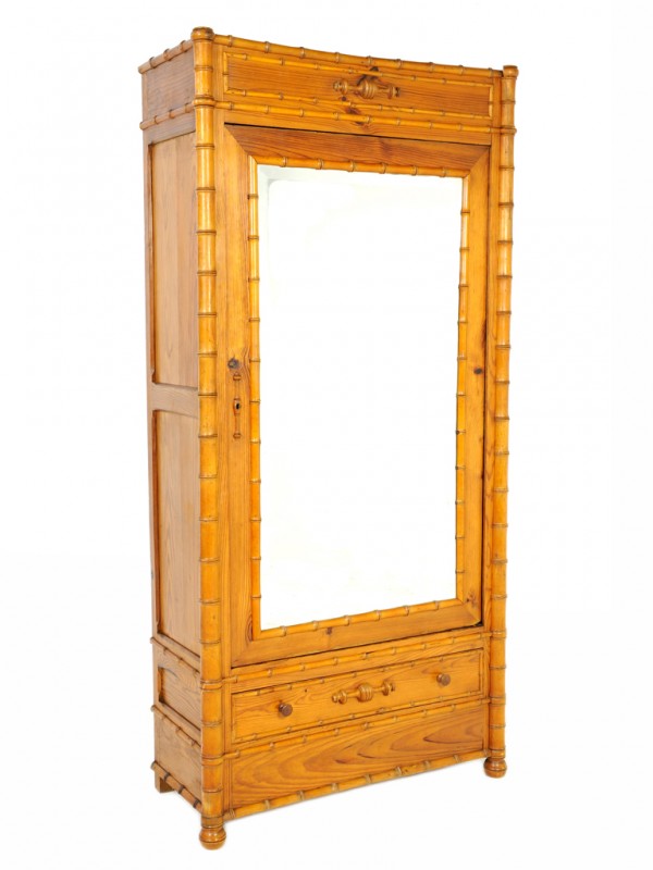 A FRENCH BEAUX ARTS PINE "BAMBOO" STYLE ARMOIRE: A FRENCH BEAUX ARTS PINE "BAMBOO" STYLE ARMOIRE early 20th Century single door having a beveled mirror 80 x 38 x 16 inches