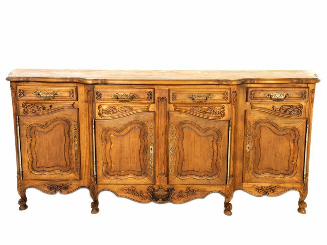 A LOUIS XV STYLE CARVED WALNUT SHAPED FRONT BUFFET: A LOUIS XV STYLE CARVED WALNUT SHAPED FRONT BUFFET having a parquet top with serpentine sides; fitted with 4 drawers and 4 doors 41 x 98 x 24 inches