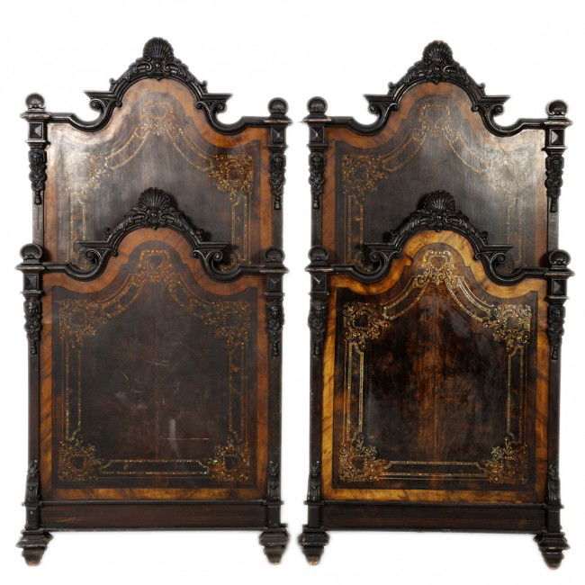 A PAIR OF PAINTED IRON BEDS WITH MOTHER OF PEARL: A PAIR OF RARE FRENCH FAUX BOIS PAINTED AND MOTHER OF PEARL INLAID TOLE AND IRON BEDS Mid 19th Century. Shaped, moulded and arched headboards and footboards with shell cartouche finials; each stile wi