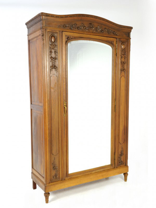 A LOUIS XVI WALNUT ARMOIRE: A LOUIS XVI WALNUT ARMOIRE beveled mirror 89 x 53 x 20 inches