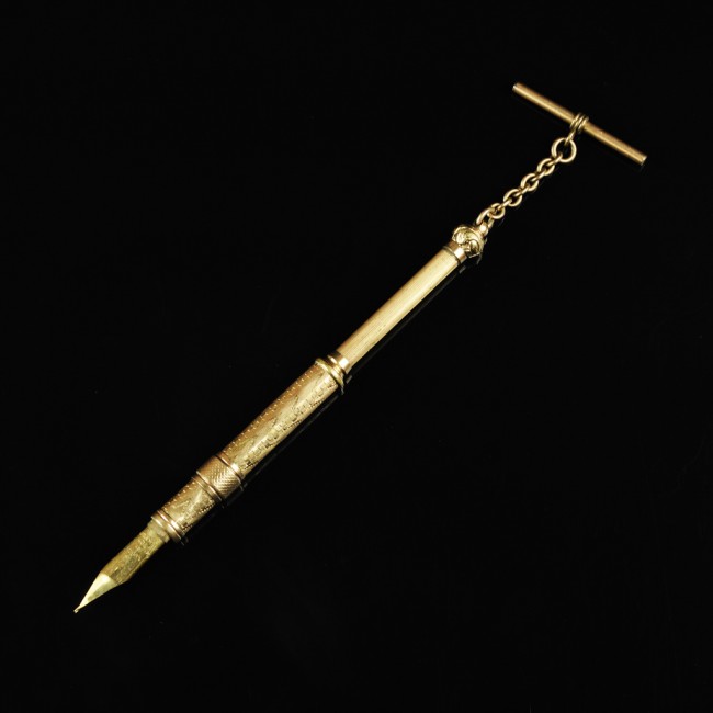 GOLD FILLED LEROY FAIRCHILD DIP PEN/PENCIL: GOLD FILLED LEROY FAIRCHILD DIP PEN/PENCIL Patented Feb 19 1867 slide nib screw out to extent mechanical pencil top extends for writing comfort. with chain and button hole bar. Operational. Combinatio