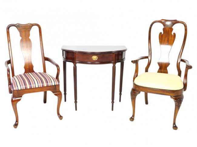 A MAHOGANY CONSOLE WITH TWO QUEEN ANN STYLE ARMCHA: A MAHOGANY CONSOLE WITH TWO QUEEN ANN STYLE ARMCHAIRS 29 1/2 x 31 1/2 x 16 inches (console) 43 x 24 1/2 x 17 inches (chairs)
