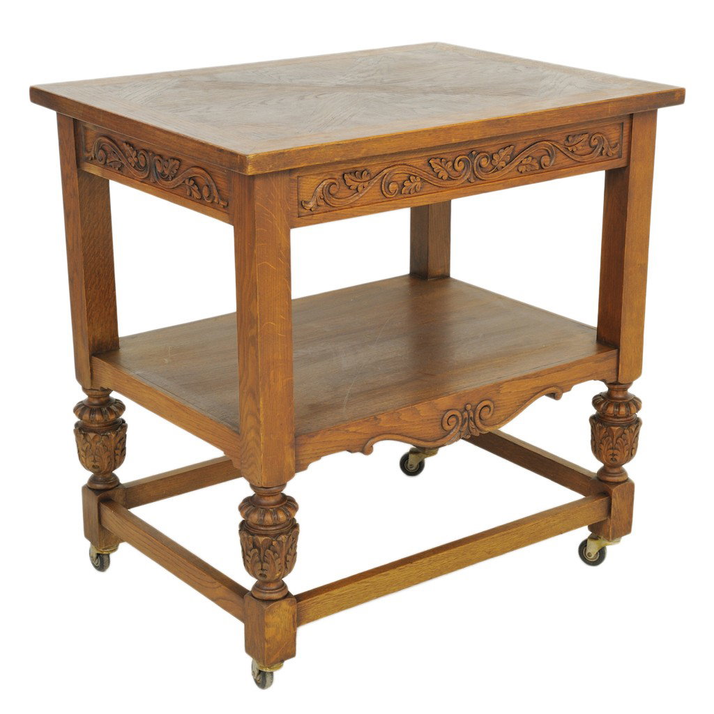 A RENAISSANCE OAK TEA CART: A RENAISSANCE OAK TEA CART parquet top 32 x 31 1/2 x 23 1/2 inches
