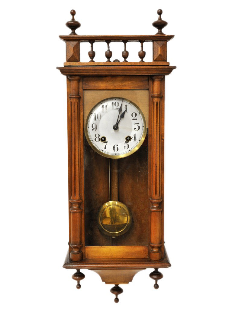 A HENRY II WALNUT WALL CLOCK: A HENRY II WALNUT WALL CLOCK 30 x 11 x 7 inches