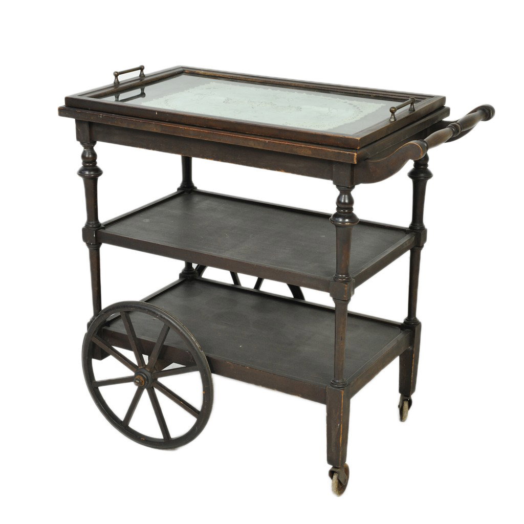AN ANTIQUE MAHOGANY TEA CART WITH REMOVABLE GLASS : AN ANTIQUE MAHOGANY TEA CART WITH REMOVABLE GLASS TRAY American with two lower platforms on two large wheels and two smaller wheels with original casters 31 x 32 x 18 inches