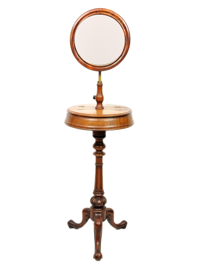 AMERICAN FRENCH VICTORIAN WALNUT GENTLEMEN'S SHAVIN: AMERICAN FRENCH VICTORIAN WALNUT GENTLEMEN'S SHAVING OR DRESSING STANDthe deeply moulded figured walnut framed original mirror on adjustable tilting brass fitting; the circular table with two lift-top