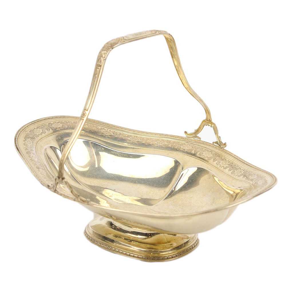 A WATSON COMPANY STERLING SILVER BASKET engraved and: A WATSON COMPANY STERLING SILVER BASKET engraved and monogramed handle; floral engraved rim total weight 1 lb 0.4 oz 8 x 11 1/2 x 8 1/2 inches