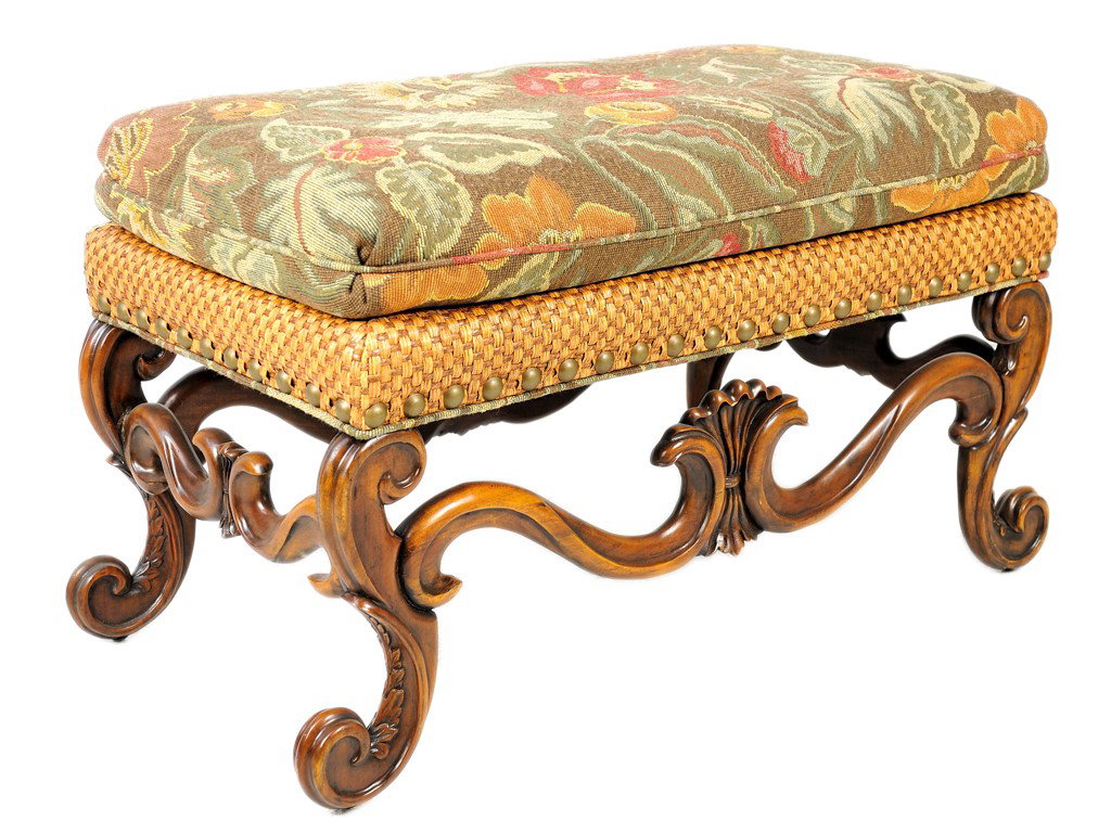 A SPANISH STYLE TAPESTRY UPHOLSTERED FRUITWOOD WI: A SPANISH STYLE TAPESTRY UPHOLSTERED FRUITWOOD WINDOW SEAT, 20th Century woven wicker deck with large brass nail heads; on foliate detailed outward ""s"" scroll legs and feet; joined back by a shaped 