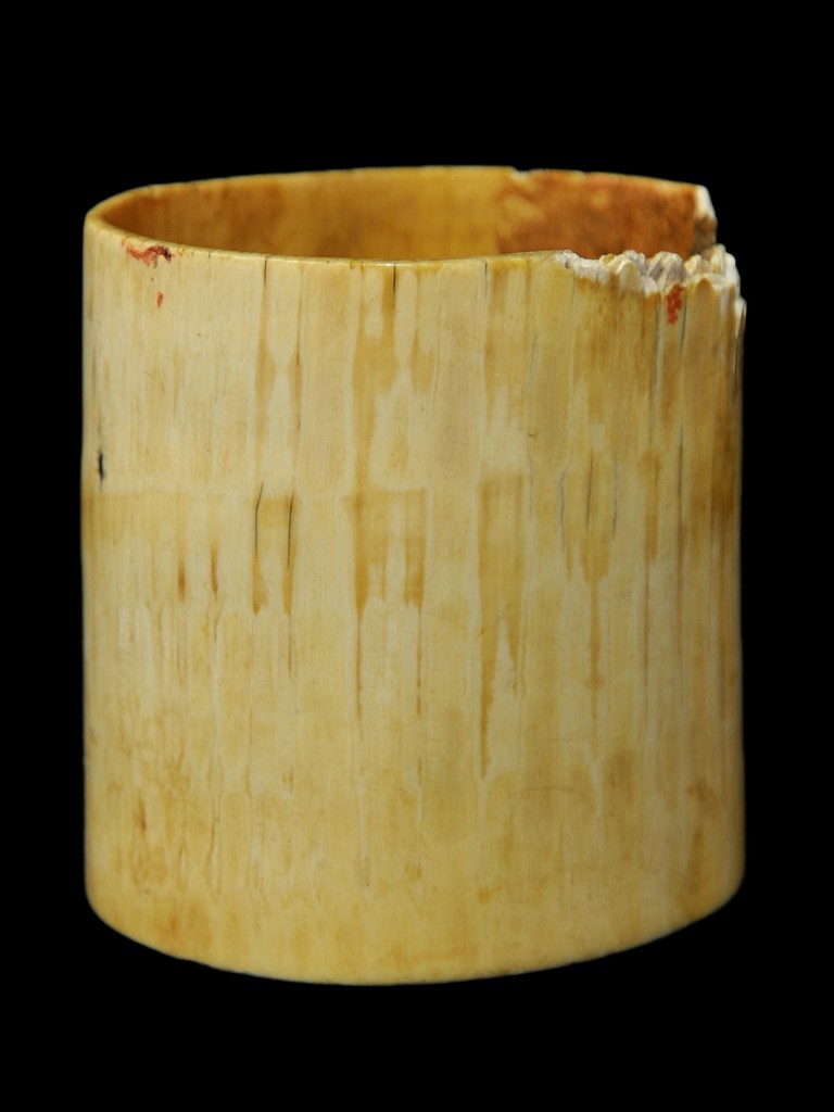 LARGE SECTION OF OLD AFRICAN ELEPHANT TUSK: LARGE SECTION OF OLD AFRICAN ELEPHANT TUSK The thickness of the large tusk section decreasing from one end to the other, with well worn patina (one quarter of thinner edge cracked off) 5 1/8 inch heig