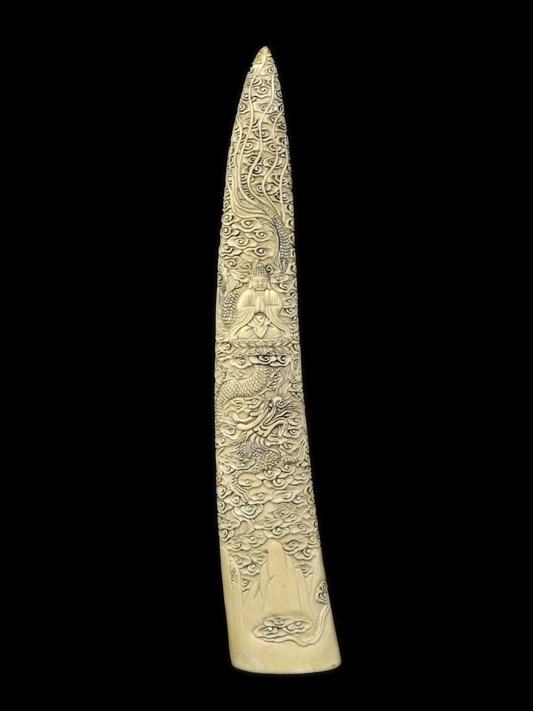 A CHINESE CARVED IVORY TUSK, Probably 20th Century: A CHINESE CARVED IVORY TUSK, Probably 20th Century 12 x 2 x 2 inches