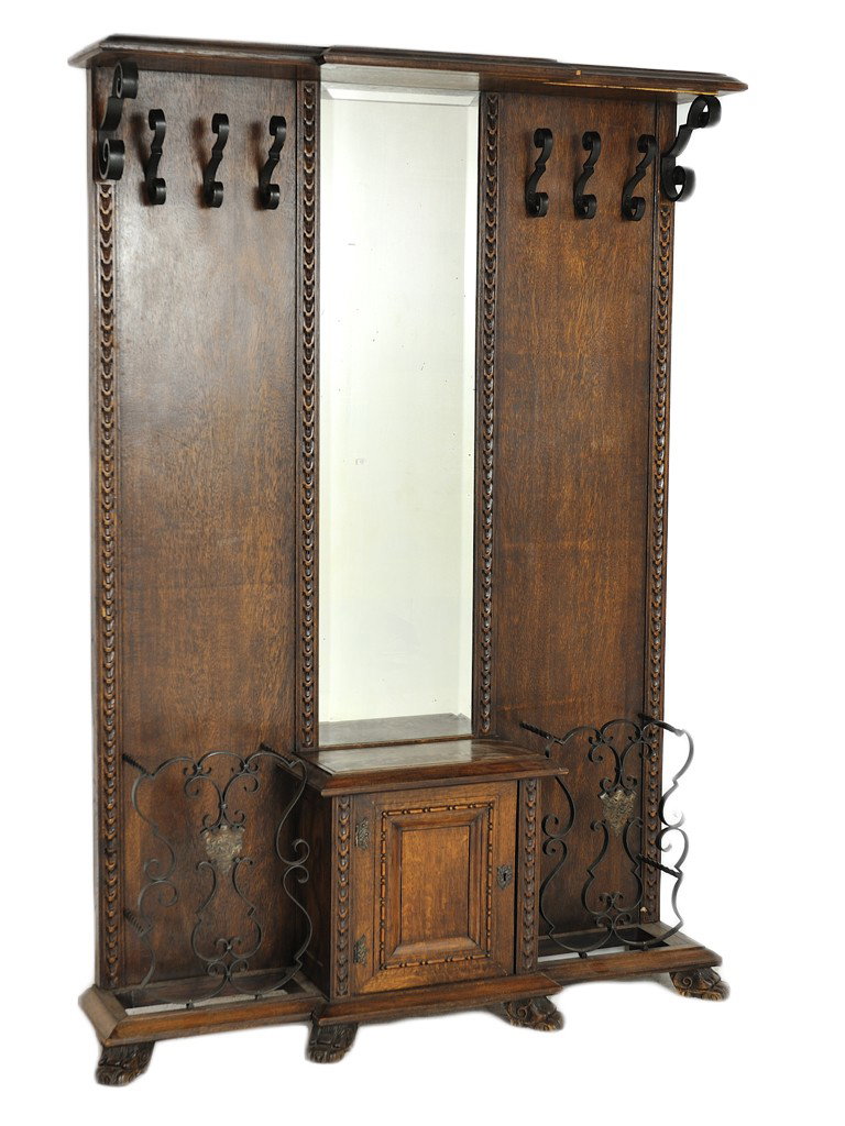 A RENAISSANCE OAK HALL TREE: A RENAISSANCE OAK HALL TREEbeveled mirror 74 1/2 x 52 x 12 inches