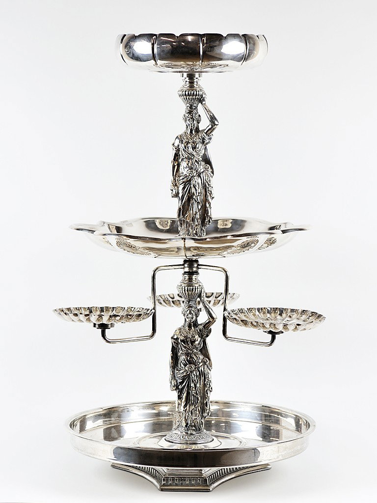 A SILVER PLATE FOUR TIER EPERGNE: A SILVER PLATE FOUR TIER EPERGNE marked ""© L&L WMC"" to base 29 1/2 x 16 1/2 x 16 1/2 inches