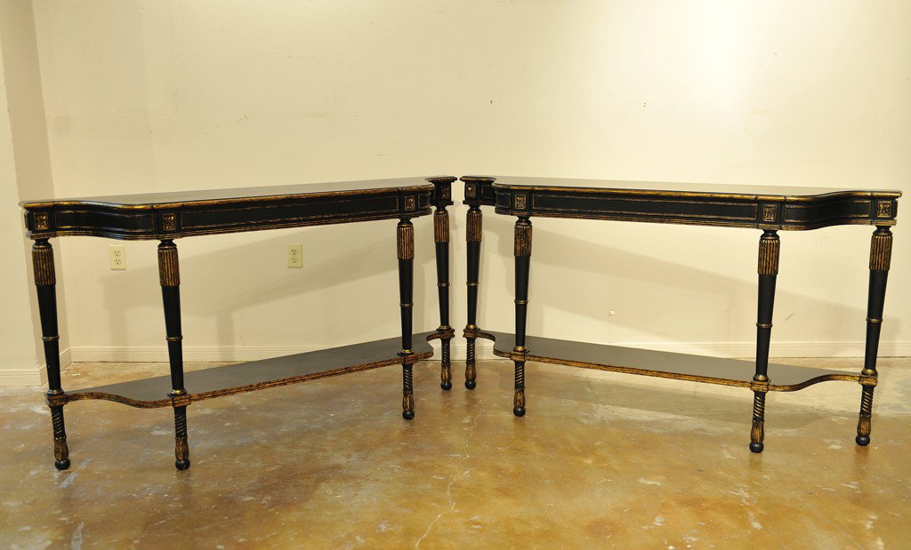 A PAIR OF EBONIZED AND GOLD FINISHED SOFA TABLES: A PAIR OF EBONIZED AND GOLD FINISHED SOFA TABLES 36 x 66 x 14 inches