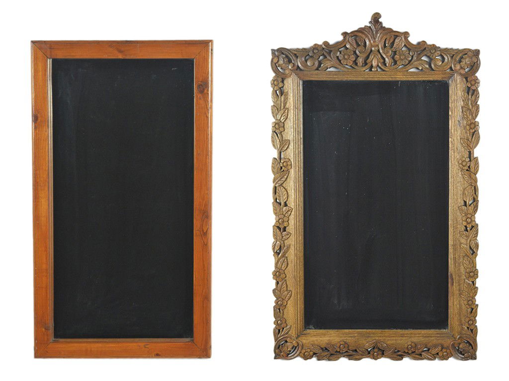 A PAIR OF WALL MIRRORS: A PAIR OF WALL MIRRORS one stained pine and the other pierce carved oak largest 40 1/2 x 24 x 2 inches