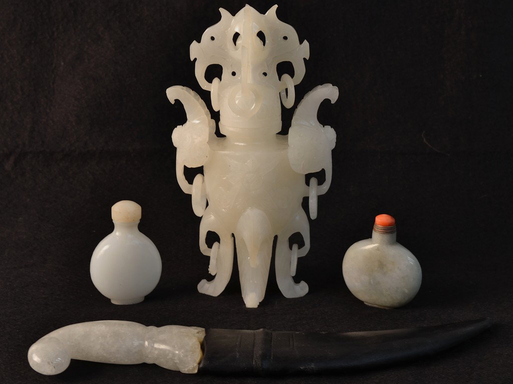 A LOT OF 4 JADE & HARDSTONE ITEMS: A LOT OF 4 JADE & HARDSTONE ITEMS Consisting of a small Mughal dagger, two Chinese snuff bottles, and a decorative Chinese vase with lid 11 x 1 ½ x 1 inches