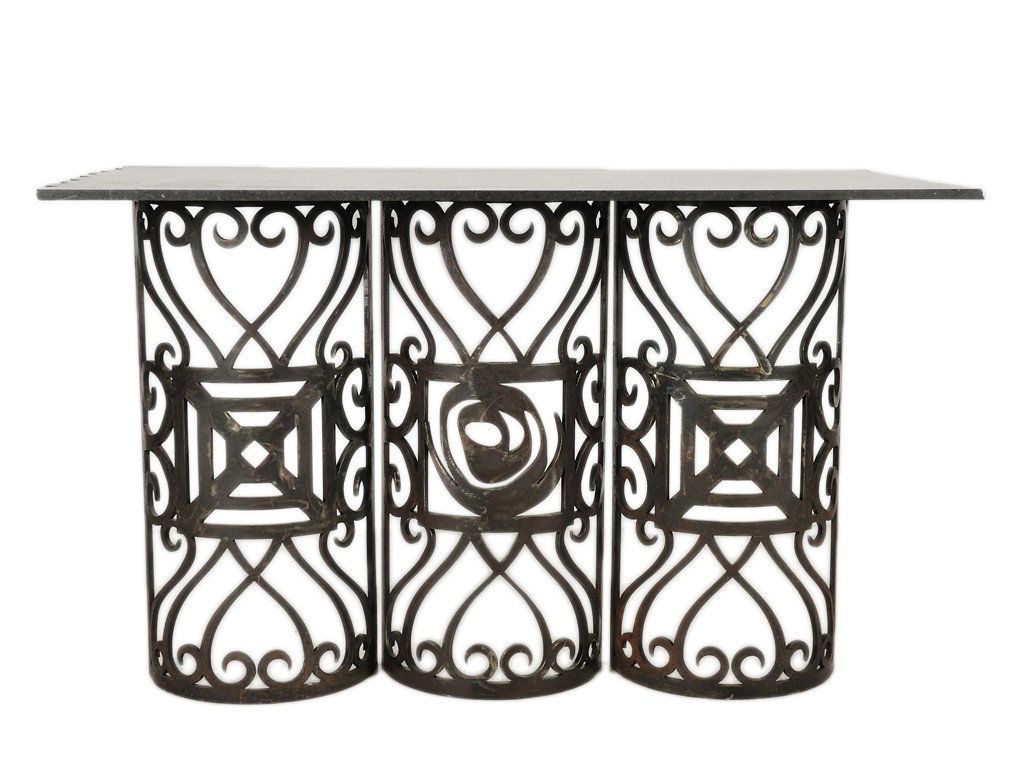 AN UNUSUAL POLISHED GRANITE AND CAST IRON CONSOLE: AN UNUSUAL POLISHED GRANITE AND CAST IRON CONSOLE TABLE Consisting of a rough cut granite top atop three large decorative cast iron supports 42 x 67 x 39 inches