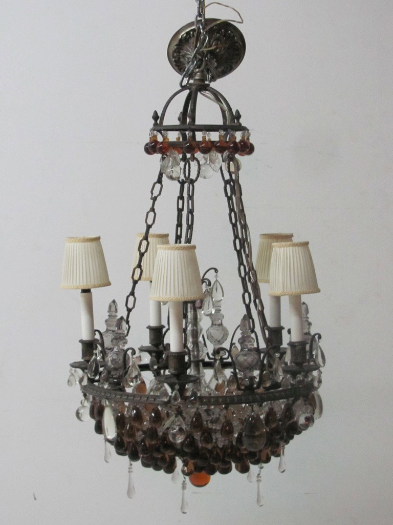 BRASS AND GLASS PENDANT FIVE LIGHT CHANDELIER: BRASS AND GLASS PENDANT FIVE LIGHT CHANDELIER upper canopy with cut glass pendants and amber glass ball pendants. Chains suspend lower body with five shaded lights and clear glass finials. Swags to ce