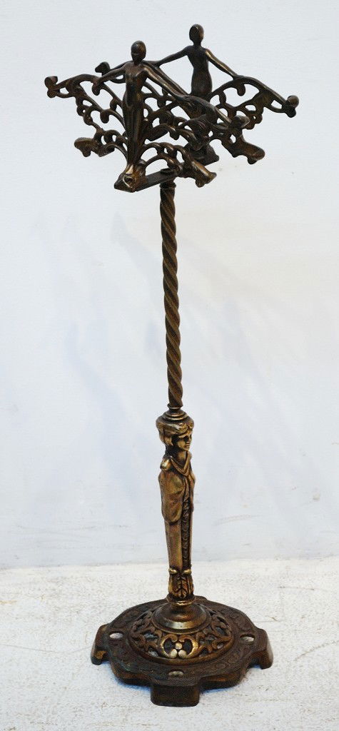 AN ART DECO FIGURAL NUDE BRONZE FISH BOWL STAND: AN ART DECO FIGURAL NUDE BRONZE FISH BOWL STAND Now lacking the original glass bowl. Support rod with a figural projecting faces. 37-1/2 x 13 x 9-1/2 inches