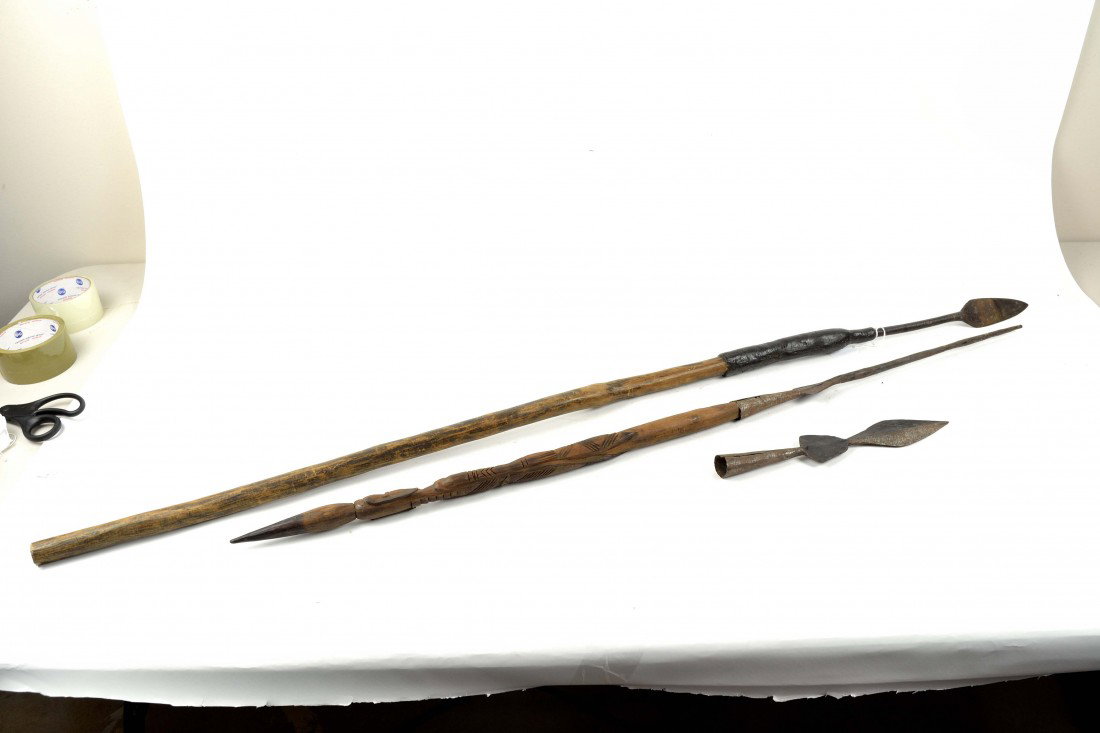 A TRIO OF SE ASIAN AND SOUTH PACIFIC TRIBAL WEAPONS: A TRIO OF SE ASIAN AND SOUTH PACIFIC TRIBAL WEAPONS Consisting of a harpoon and two spears 2 x 49 inches
