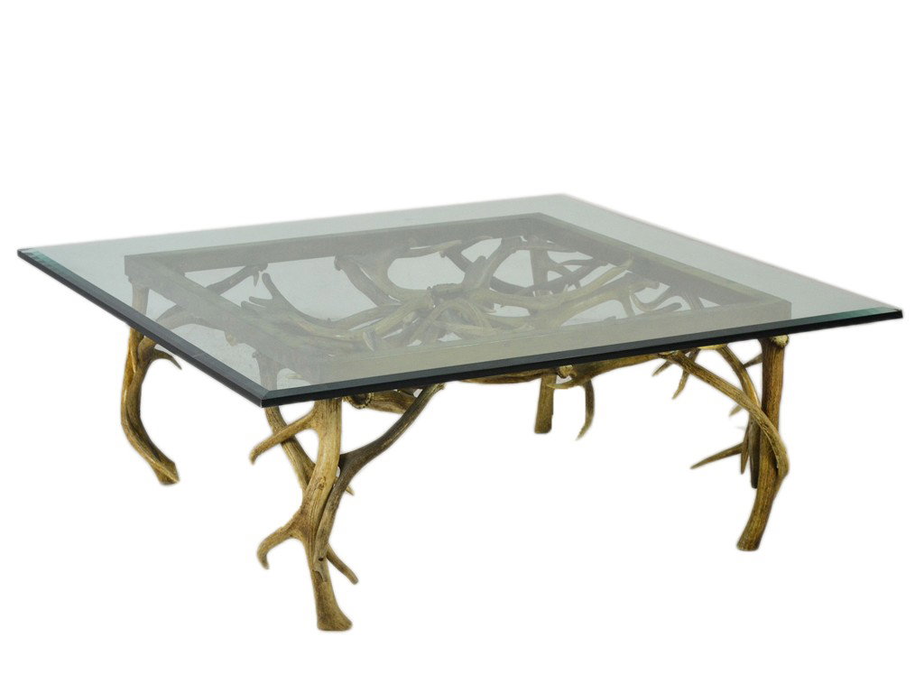 AN UNUSUAL ANTLER , BRASS, AND GLASS TOP DESIGNER: AN UNUSUAL ANTLER , BRASS, AND GLASS TOP DESIGNER COFFEE TABLE of impressive dimensions and design 18 x 36 x 36 inches