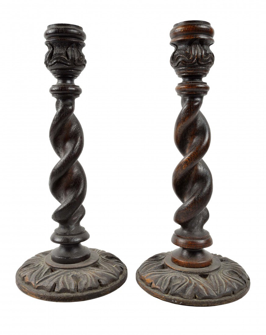 A PAIR OF WOODEN BARLEY TWIST CANDLESTICKS: A PAIR OF WOODEN BARLEY TWIST CANDLESTICKS 12 ½ x 5 ½ x 5 ½ inches