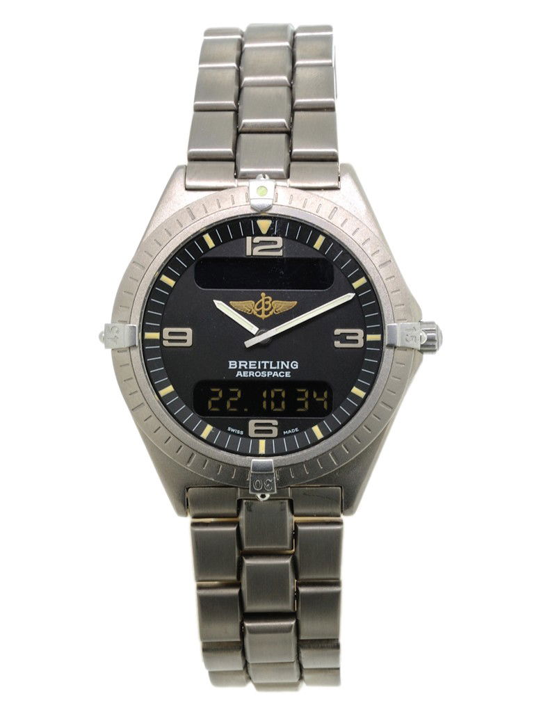 TITANIUM BREITLING AEROSPACE: TITANIUM BREITLING AEROSPACE Titanium case and band. Foldover buckle. E56060, 1-4033. Excellent condition.