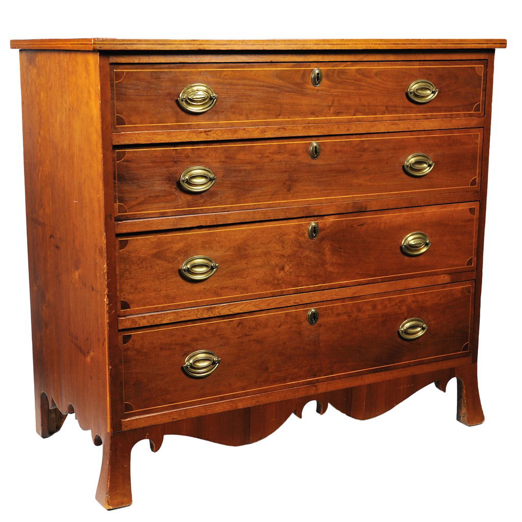 A FEDERAL CHERRY CHEST WITH FOUR DRAWERS America,: A FEDERAL CHERRY CHEST WITH FOUR DRAWERS America, 1800-1820 The cherry top with satinwood and ebony inlays is supported by a rectilinear body housing four graduated, locking drawers with satinwood and