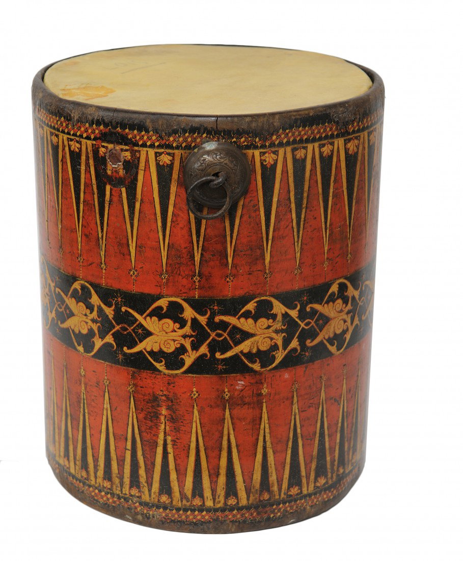 A HAND-PAINTED WOODEN DRUM SHAPE BIN Continental: A HAND-PAINTED WOODEN DRUM SHAPE BIN Continental Military drum style, with iron circular fastener; original skin top with black and gold spear head motif at top on a red ground with a black band and g