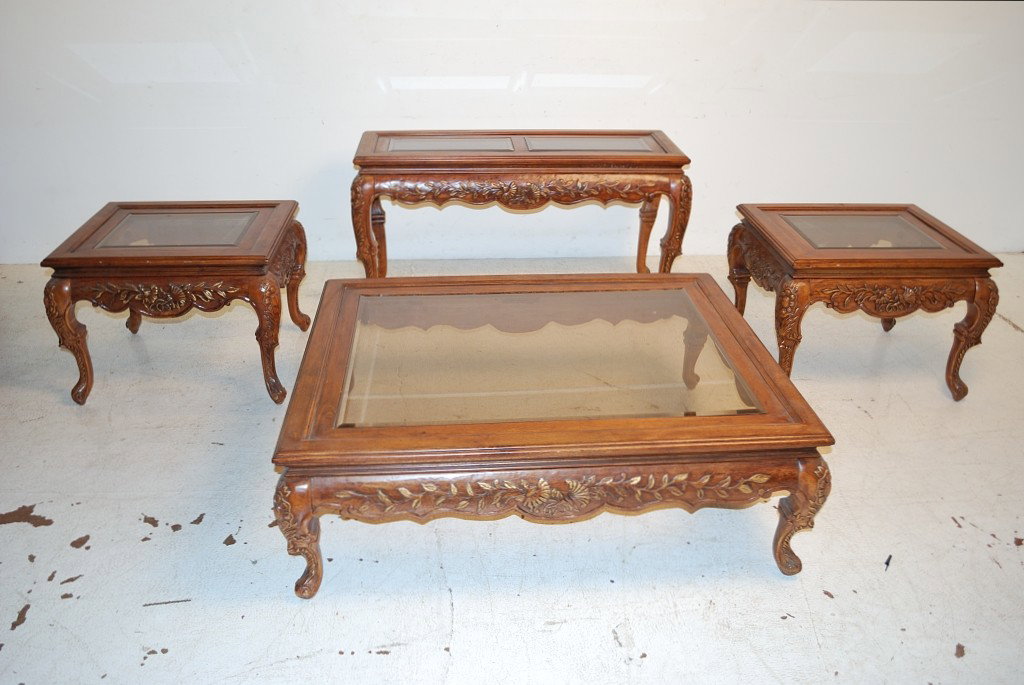 A LOT OF 4 DECORATIVE GLASS TOP TABLES: A LOT OF 4 DECORATIVE GLASS TOP TABLES Consisting of a sofa table, a pair of end tables, and a coffee table 17 ½ x 50 x 40 inches