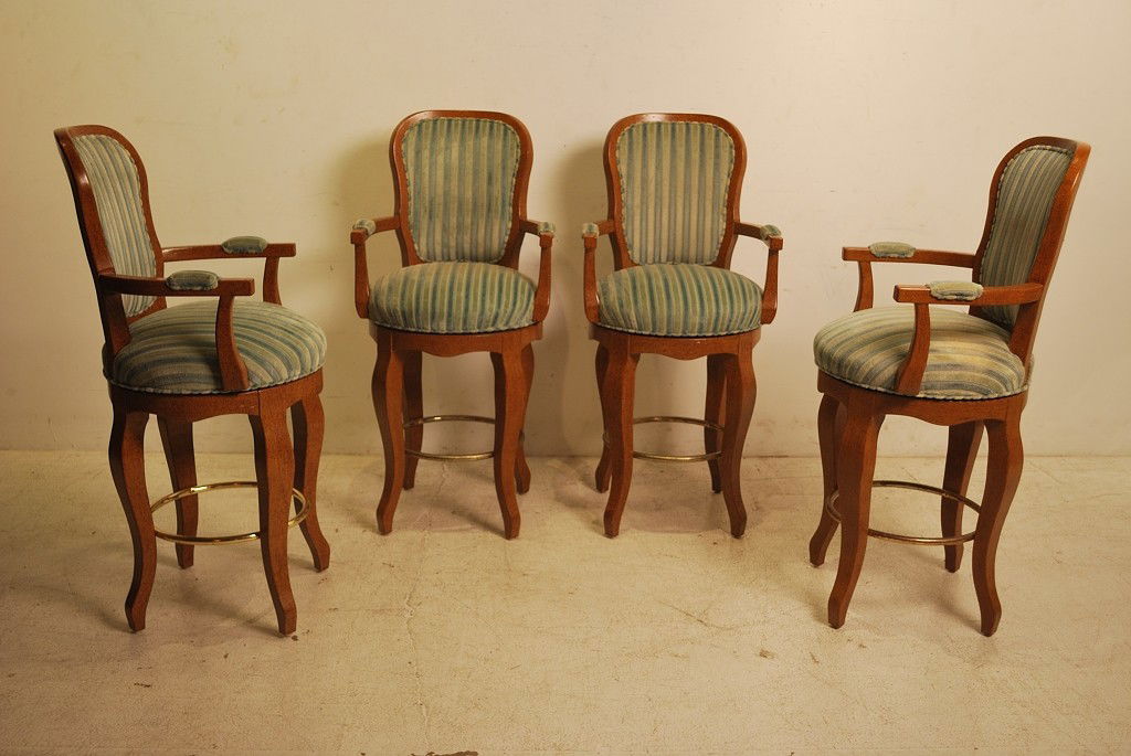 A SET OF 4 BEACON HILL SWIVEL BAR CHAIRS: A SET OF 4 BEACON HILL SWIVEL BAR CHAIRS With an attractive pecan finish and striped chenille fabric upholstery 47 x 23 x 19 inches