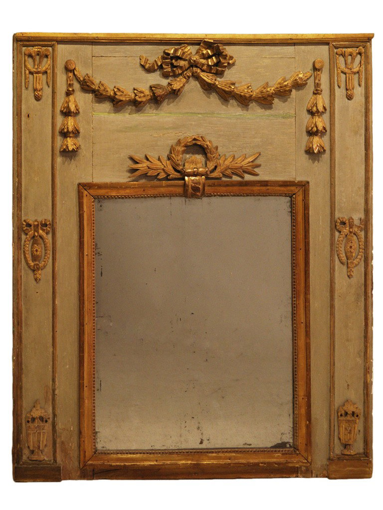 A LOUIS XVI STYLE PAINTED AND PARCEL GILT TRUMEAU : A LOUIS XVI STYLE PAINTED AND PARCEL GILT TRUMEAU 19th Century The rectilinear painted plank body features a frieze with appliques of hand carved giltwood ribbons and bows with draping bellflower garl