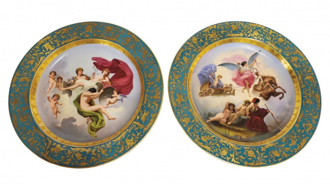 A PAIR OF LARGE ROYAL VIENNA PAINTED, GILDED, AND : A PAIR OF LARGE ROYAL VIENNA PAINTED, GILDED, AND DECORATED PORCELAIN PLATES Austria, 19th Century Each large circular plate having a central painted tondo; the first depicting Peace in her chariot ho