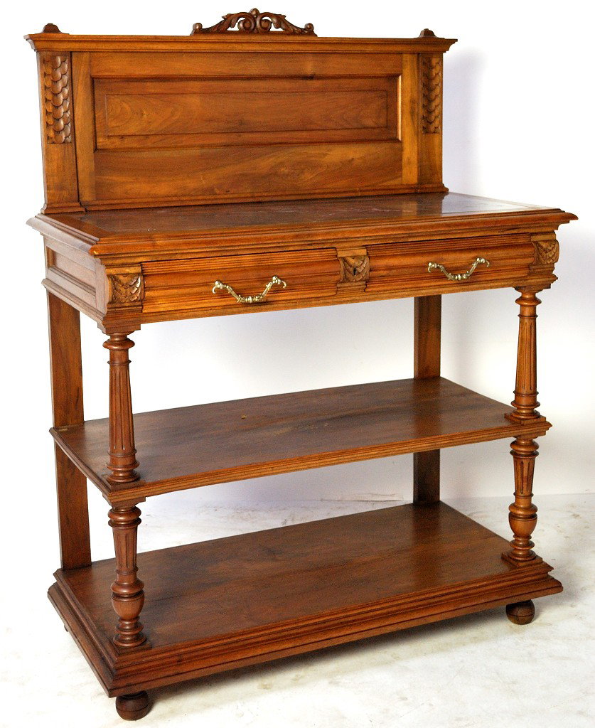 A HENRI II WALNUT SIDEBOARD: A HENRI II WALNUT SIDEBOARD 56 x 43 x 20 inches