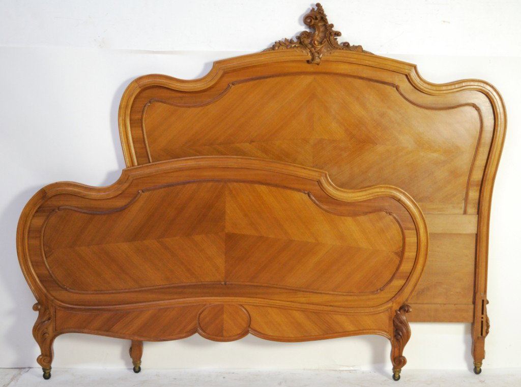 A LOUIS XV CARVED BED: A LOUIS XV CARVED BED 57 ½ x 74 inches