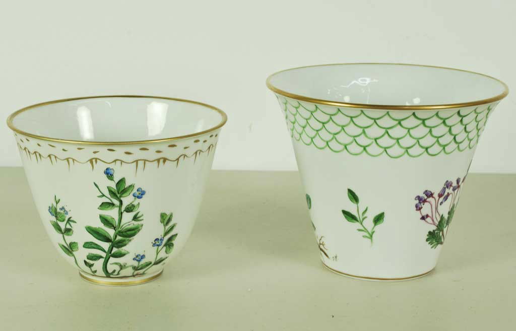 A PAIR OF FLORA DANICA DANISH PORCELAIN CACHE POTS: Two broad vases or cache pots, Flora Danica, made in Denmark for Neiman Marcus, dated 1970. Signed by the artist. 6 x 7 x 7 inches