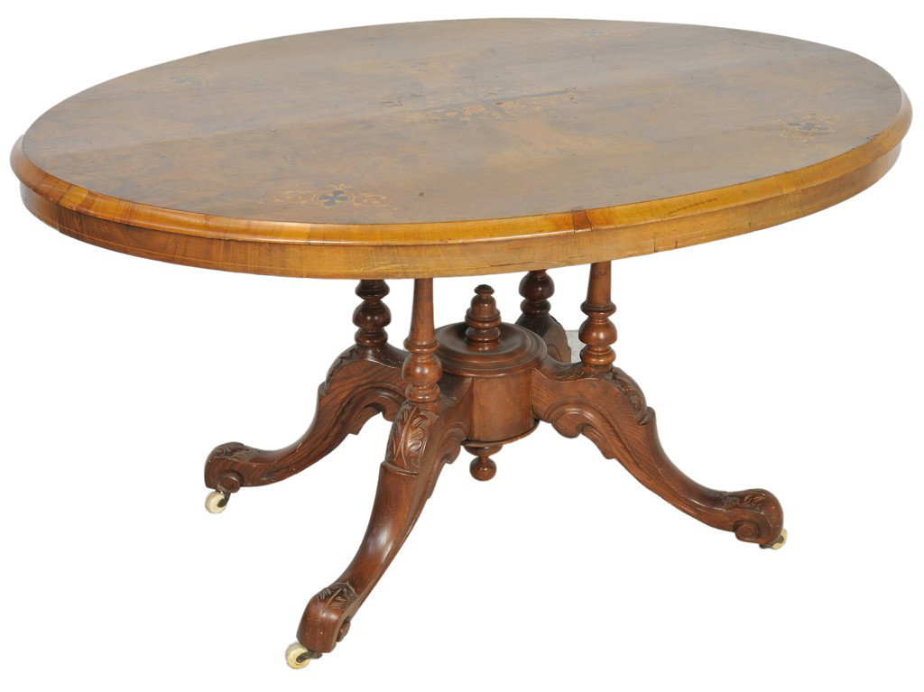 AN ENGLISH INLAID TILT TOP WALNUT LOO TABLE Mid 19: AN ENGLISH INLAID TILT TOP WALNUT LOO TABLE Mid 19th Century The burled finely inlaid top surmounting carved baluster supports and downswept legs. 28 x 52 1/2 x 39 inches (71 x 132.08 x 99.06 cm)