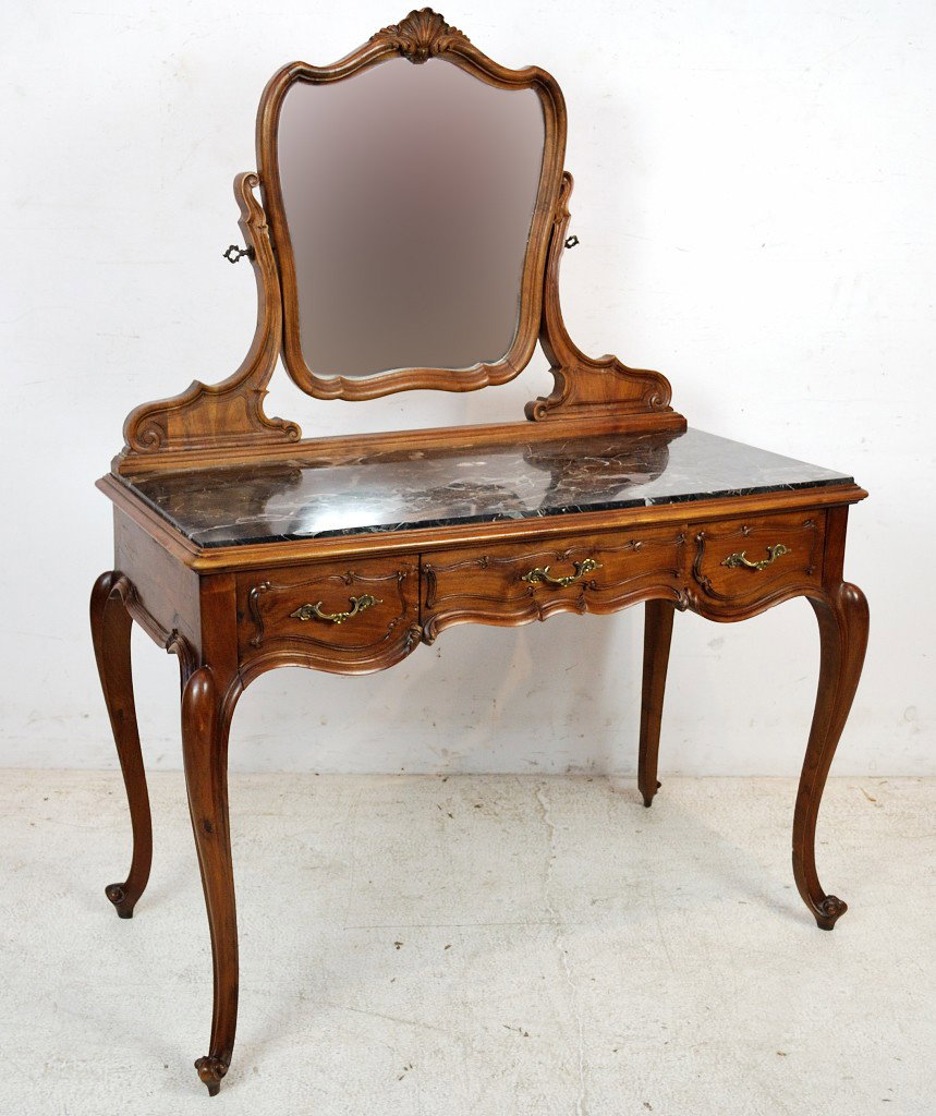 A VINTAGE ROCOCO STYLE WALNUT VANITY TABLE WITH MI: A VINTAGE ROCOCO STYLE WALNUT VANITY TABLE WITH MIRROR Middle 20th Century 58 x 43 x 22 ½ inches