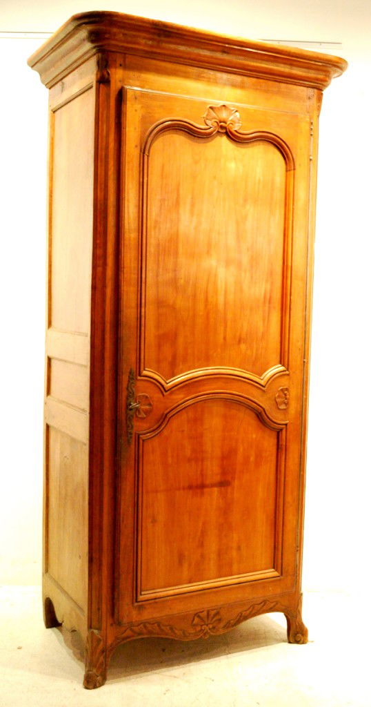 A CARVED CHERRYWOOD BONNETIÈRE 19th Century: A CARVED CHERRYWOOD BONNETIÈRE 19th Century