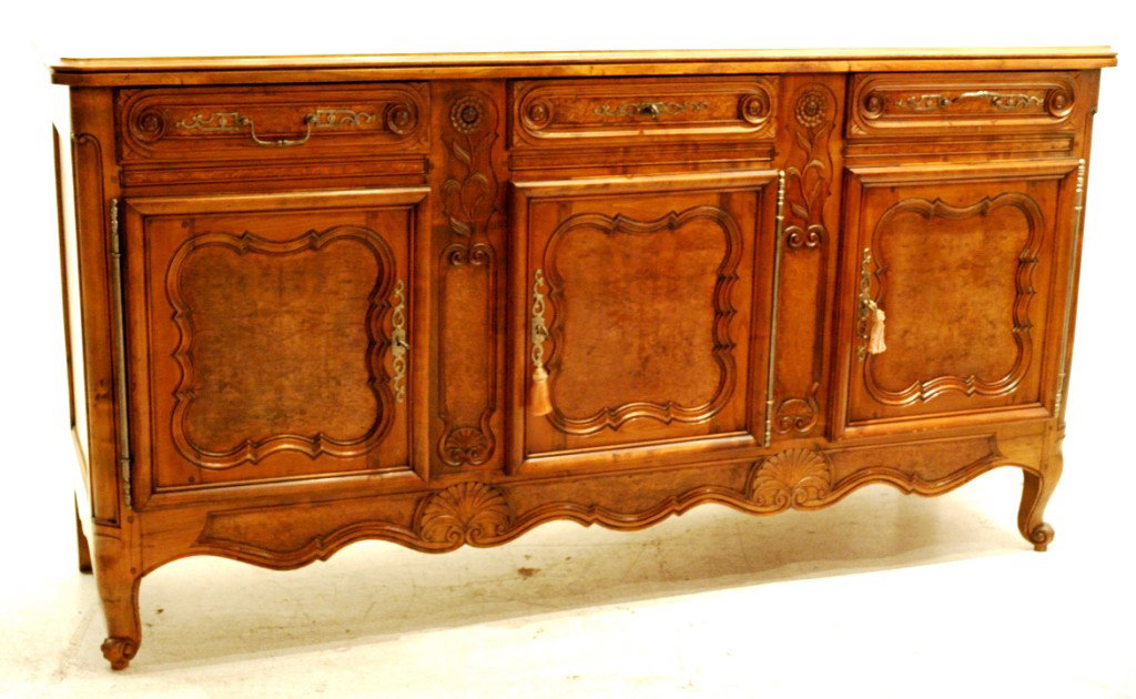 A LOUIS XV STYLE OAK SIDEBOARD Early 20th Century: A LOUIS XV STYLE OAK SIDEBOARD Early 20th Century 42½x90½x 21½ inches