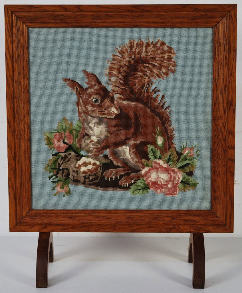 AN OAK FRAMED NEEDLEPOINT SQUIRREL FIREPLACE SCREEN: AN OAK FRAMED NEEDLEPOINT SQUIRREL FIREPLACE SCREEN 24 x 20 x 8 inches