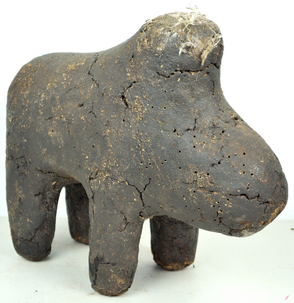 A BAMANA TRIBE CARVED WOOD FIGURE - MALI: A BAMANA TRIBE CARVED WOOD FIGURE - MALI The figure encrusted with many items and probably coated with soil, ritual animal blood, etc. 11 x 13 x 13 inches