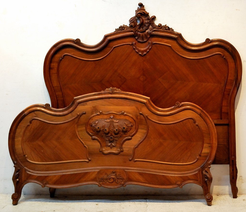 A LOUIS XV STYLE WALNUT BED: A LOUIS XV STYLE WALNUT BED width: 56"" depth: 74½ inches
