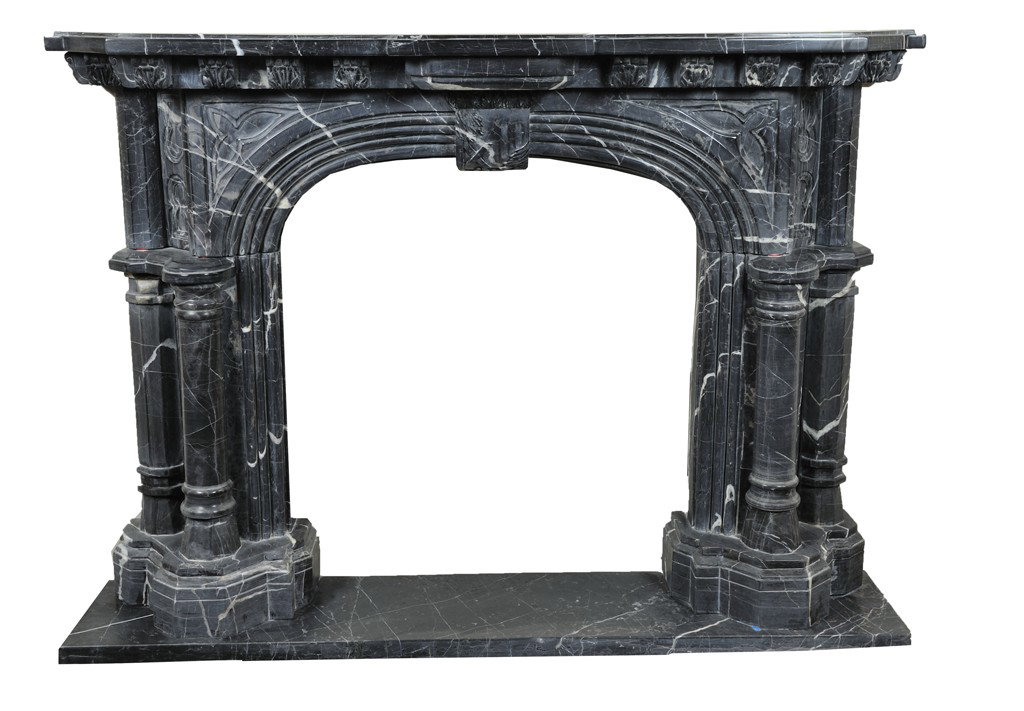 FIREPLACE SURROUND: FIREPLACE SURROUNDThis fireplace surround, influenced by the Gothic Victorian style, has a stepped and arched opening with keystone. Triple stepped columns at each corner support the stepped and shape