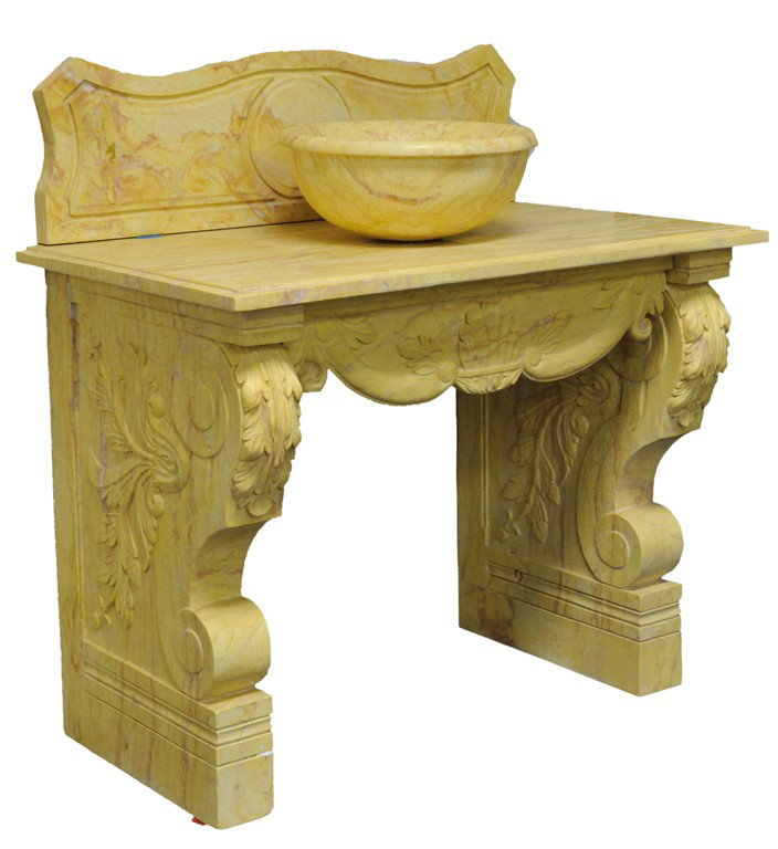 PEDASTAL SINK WITH FOLIATE CARVED CORBEL BRACKET U: PEDASTAL SINK WITH FOLIATE CARVED CORBEL BRACKET UPRIGHTSStabilized by a scalloped apron with seashell motif. The base supports a slab top andshaped backsplash with incised detail. Thesurface mounted 