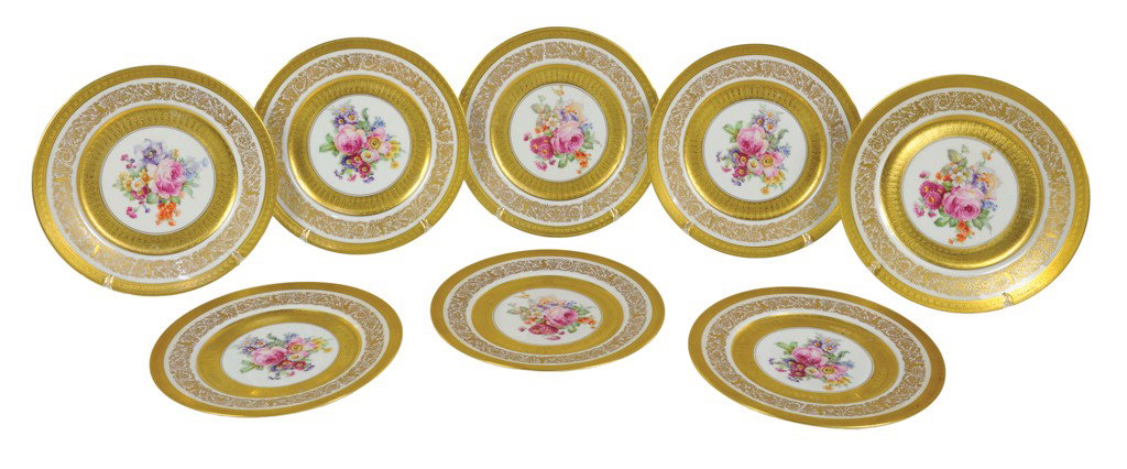 A SET OF EIGHT UNION CZECHOSLOVAKIAN GILDED AND DEC: A SET OF EIGHT UNION CZECHOSLOVAKIAN GILDED AND DECORATED CHINA PLATES The Proctor Estate Each of the dinner-sized plates having three gilded borders, the middle one with a rinçeau pattern incorporat