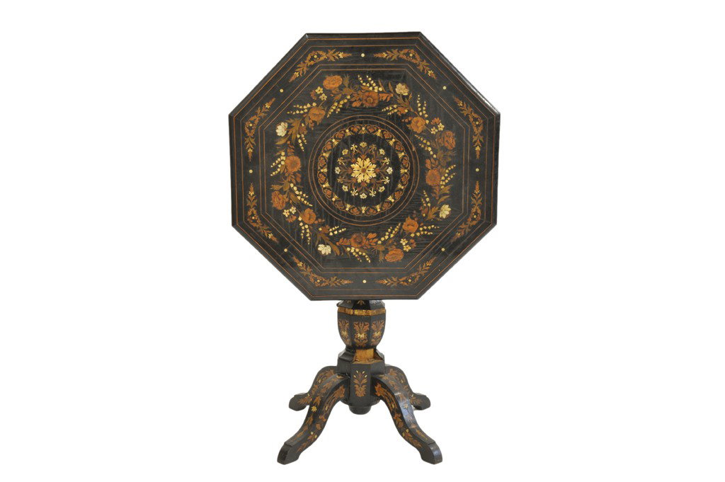 AN ITALIAN OCTAGONAL MARQUETRY TILT TOP TABLE 1st : AN ITALIAN OCTAGONAL MARQUETRY TILT TOP TABLE 1st Quarter 20th Century, The Proctor Estate The octagonal top table inlaid with a floral motif and moulded edge is supported by a faceted vase form colum